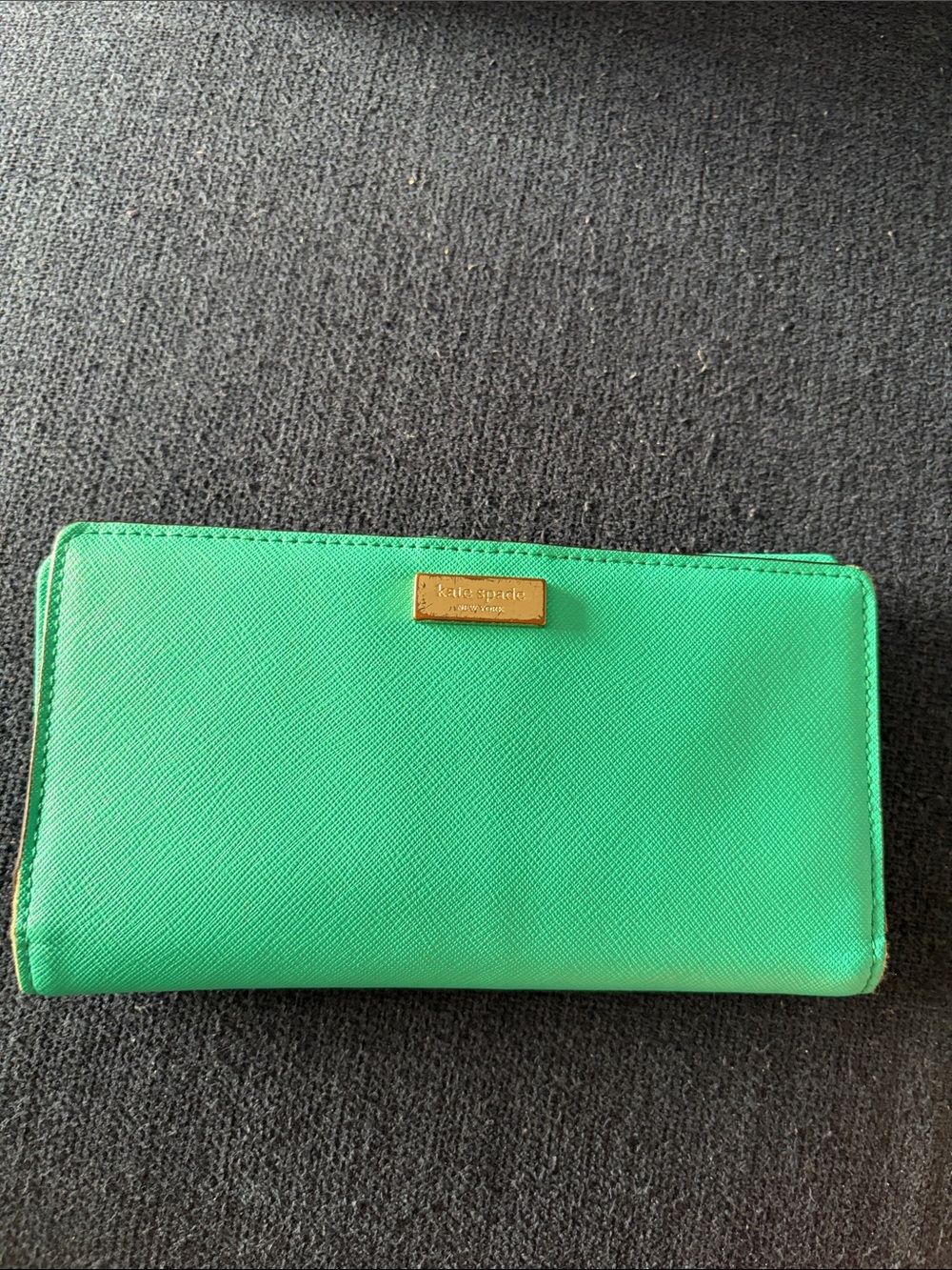 kate spade bright green zip-around saffiano wallet with gold plaque